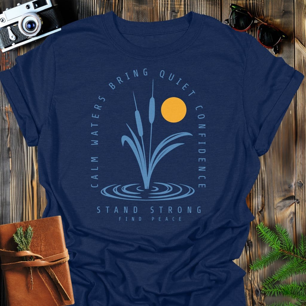 Calm Waters Bring Quiet Confidence Cattail Sunset T-Shirt In Navy / S Lightweight adventure tee for outdoor lovers Perfect for hiking camping or road trips Made from soft breathable cotton for all-day comfort Ideal for nature lovers and adventurers FAYO Threads outdoor apparel remember Fun Awaits You Outside