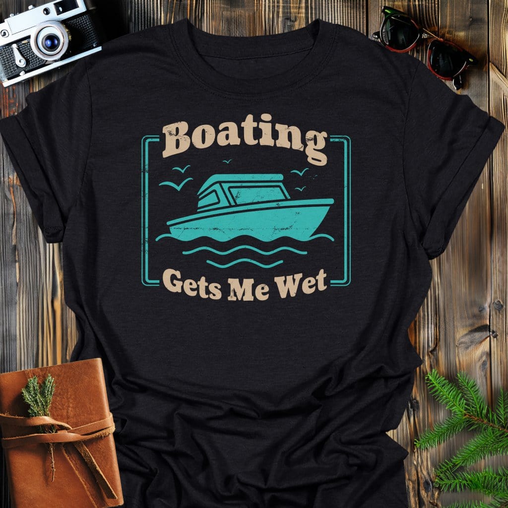 Boating Gets Me Wet T-Shirt In Black / S Lightweight adventure tee for outdoor lovers Perfect for hiking camping or road trips Made from soft breathable cotton for all-day comfort Ideal for nature lovers and adventurers FAYO Threads outdoor apparel remember Fun Awaits You Outside