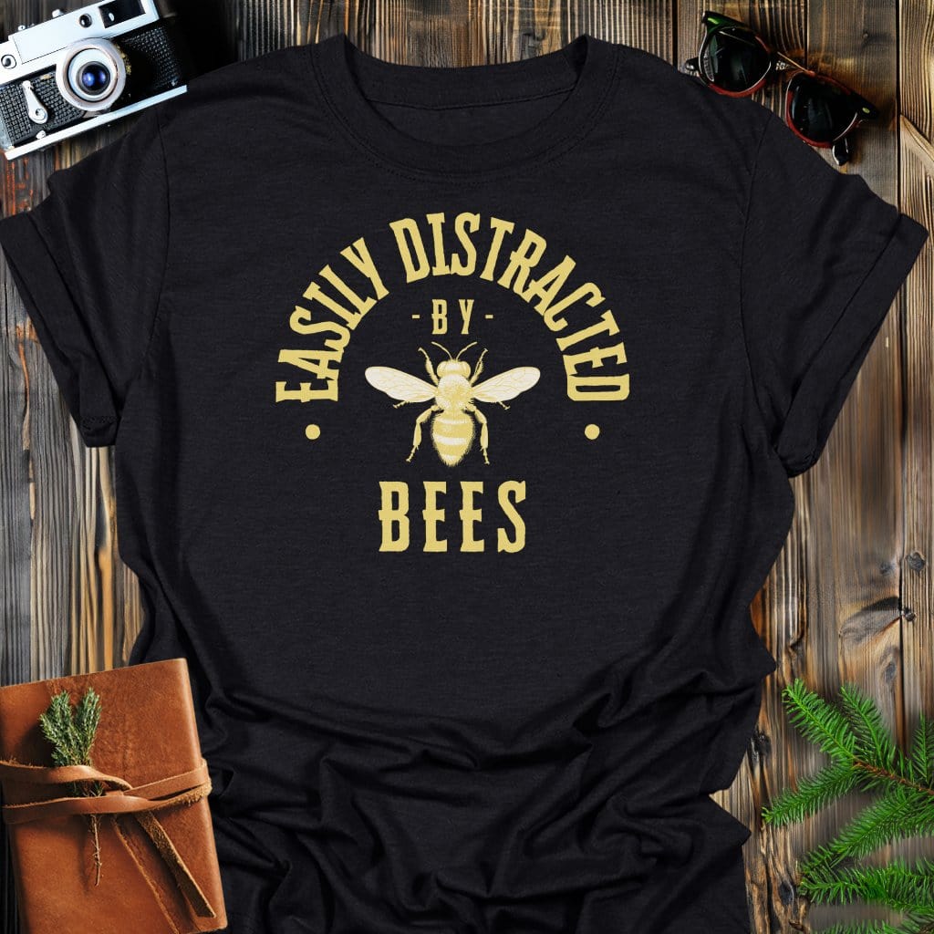 Distracted By Bees T-Shirt In S / Black Lightweight adventure tee for outdoor lovers Perfect for hiking camping or road trips Made from soft breathable cotton for all-day comfort Ideal for nature lovers and adventurers FAYO Threads outdoor apparel remember Fun Awaits You Outside