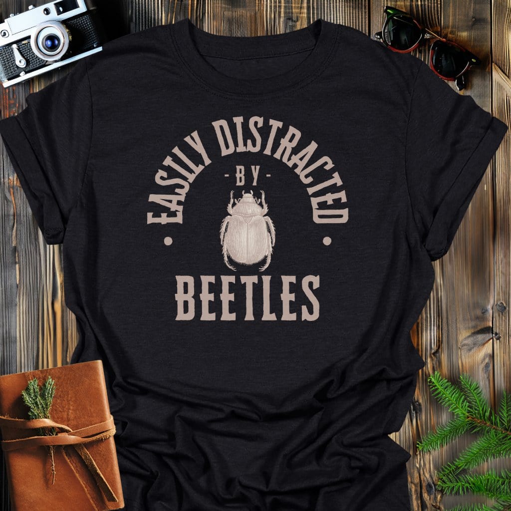 Distracted By Beetles T-Shirt In S / Black Lightweight adventure tee for outdoor lovers Perfect for hiking camping or road trips Made from soft breathable cotton for all-day comfort Ideal for nature lovers and adventurers FAYO Threads outdoor apparel remember Fun Awaits You Outside