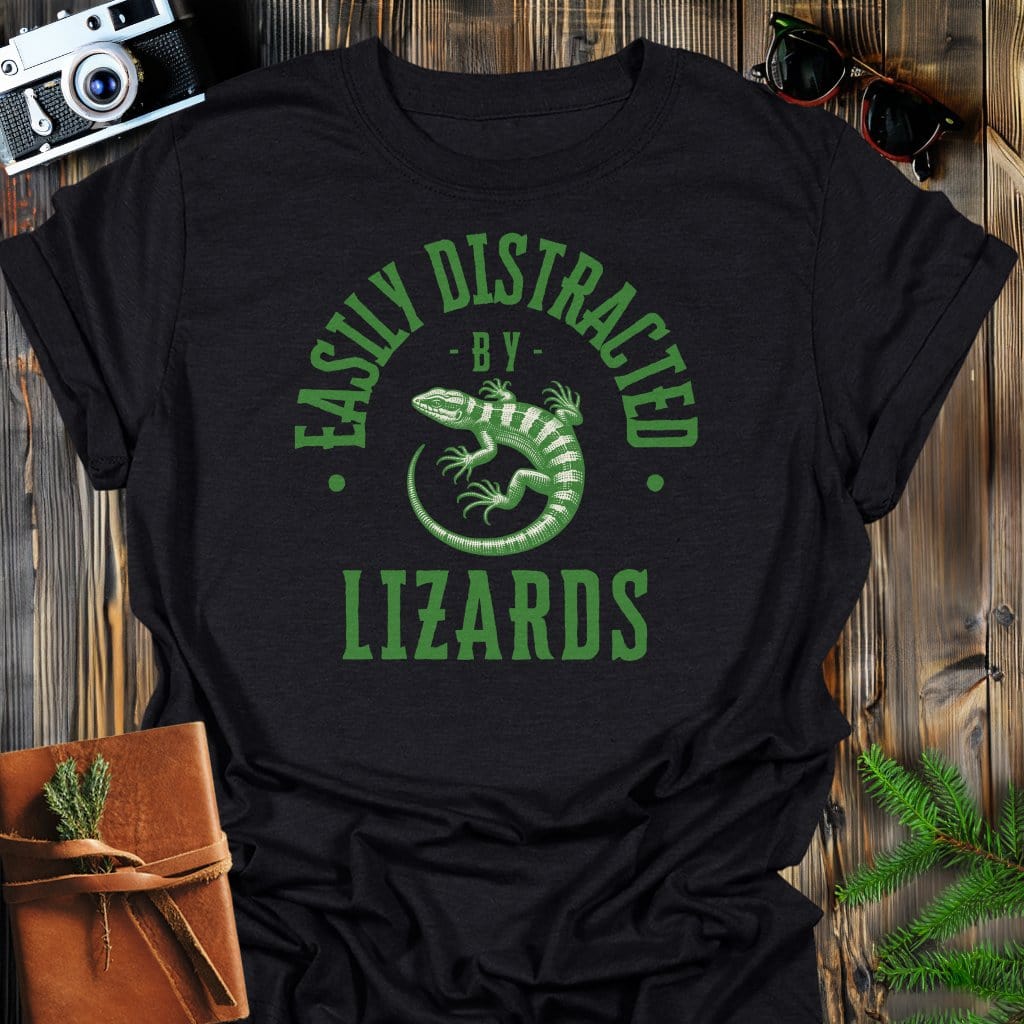 Distracted By Lizards T-Shirt In S / Black Lightweight adventure tee for outdoor lovers Perfect for hiking camping or road trips Made from soft breathable cotton for all-day comfort Ideal for nature lovers and adventurers FAYO Threads outdoor apparel remember Fun Awaits You Outside