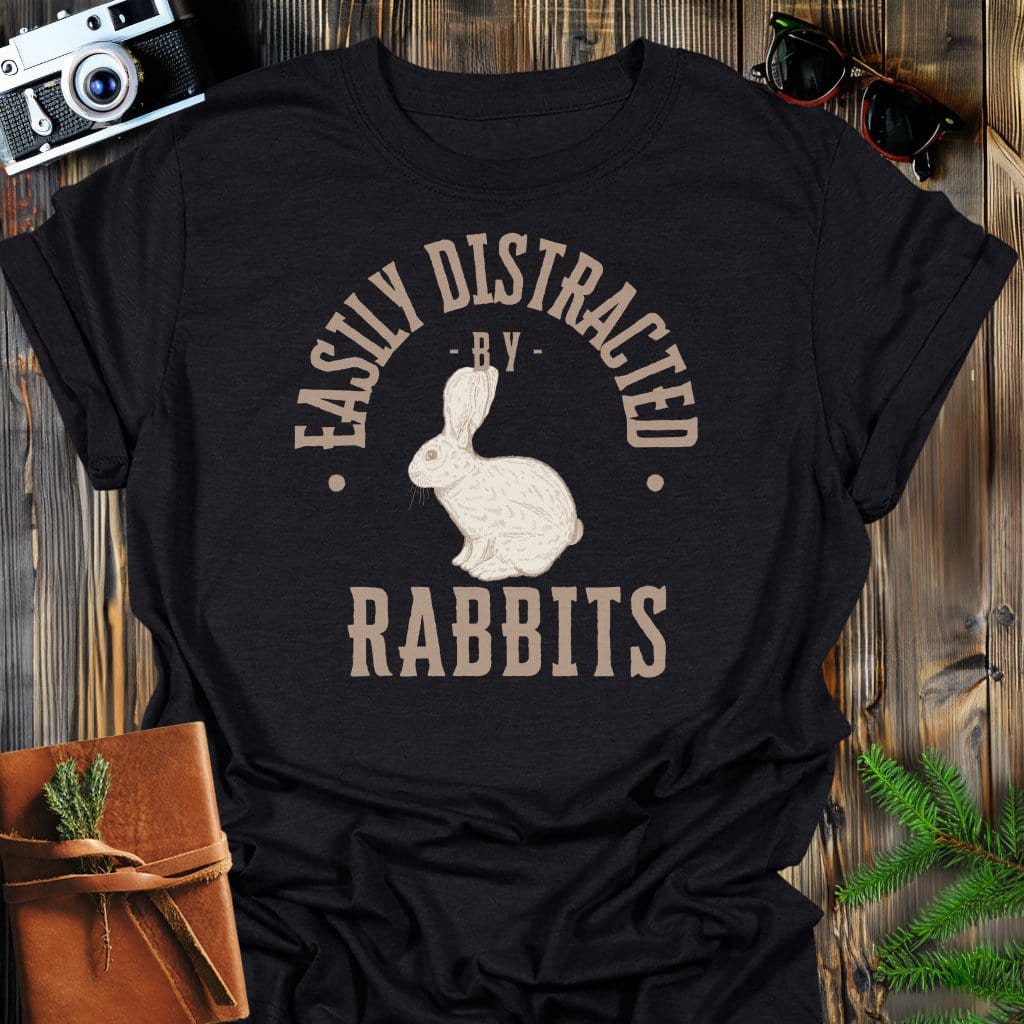 Distracted By Rabbits T-Shirt In S / Black Lightweight adventure tee for outdoor lovers Perfect for hiking camping or road trips Made from soft breathable cotton for all-day comfort Ideal for nature lovers and adventurers FAYO Threads outdoor apparel remember Fun Awaits You Outside