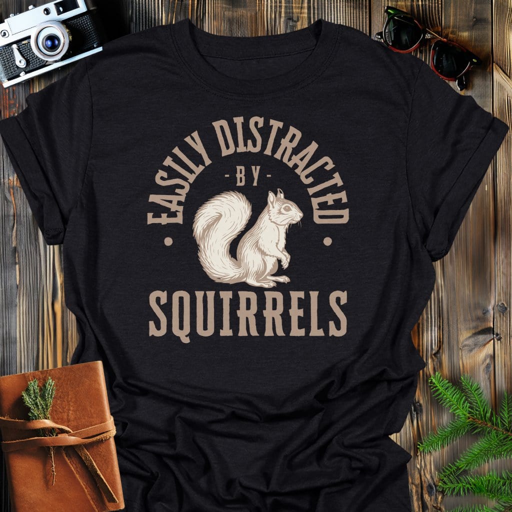 Distracted By Squirrels T-Shirt In S / Black Lightweight adventure tee for outdoor lovers Perfect for hiking camping or road trips Made from soft breathable cotton for all-day comfort Ideal for nature lovers and adventurers FAYO Threads outdoor apparel remember Fun Awaits You Outside