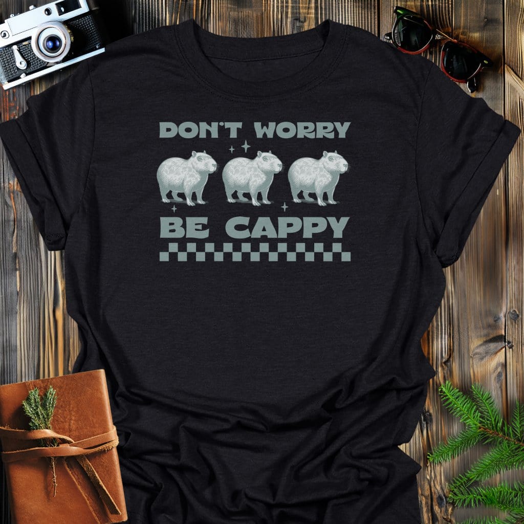 Don't Worry Be Cappy T-Shirt In Black / S Lightweight adventure tee for outdoor lovers Perfect for hiking camping or road trips Made from soft breathable cotton for all-day comfort Ideal for nature lovers and adventurers FAYO Threads outdoor apparel remember Fun Awaits You Outside