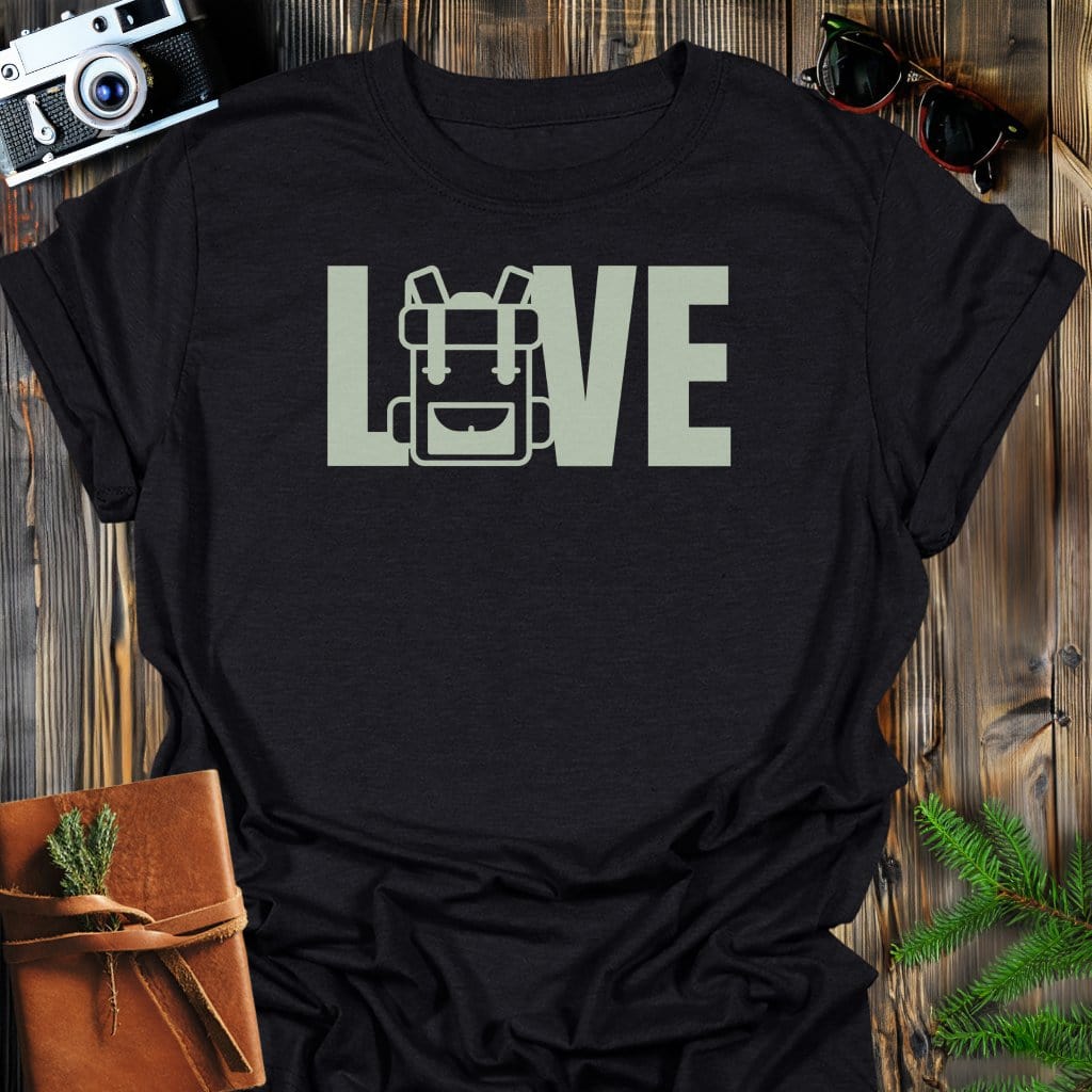Love Hiking Backpack T-Shirt In Black / S Lightweight adventure tee for outdoor lovers Perfect for hiking camping or road trips Made from soft breathable cotton for all-day comfort Ideal for nature lovers and adventurers FAYO Threads outdoor apparel remember Fun Awaits You Outside