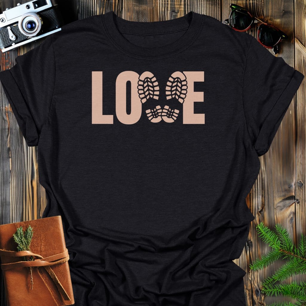Love Hiking Boot Prints T-Shirt In Black / S Lightweight adventure tee for outdoor lovers Perfect for hiking camping or road trips Made from soft breathable cotton for all-day comfort Ideal for nature lovers and adventurers FAYO Threads outdoor apparel remember Fun Awaits You Outside