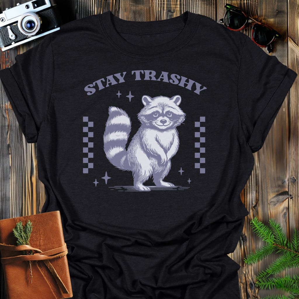 Stay Trashy Raccoon T-Shirt In Black / S Lightweight adventure tee for outdoor lovers Perfect for hiking camping or road trips Made from soft breathable cotton for all-day comfort Ideal for nature lovers and adventurers FAYO Threads outdoor apparel remember Fun Awaits You Outside