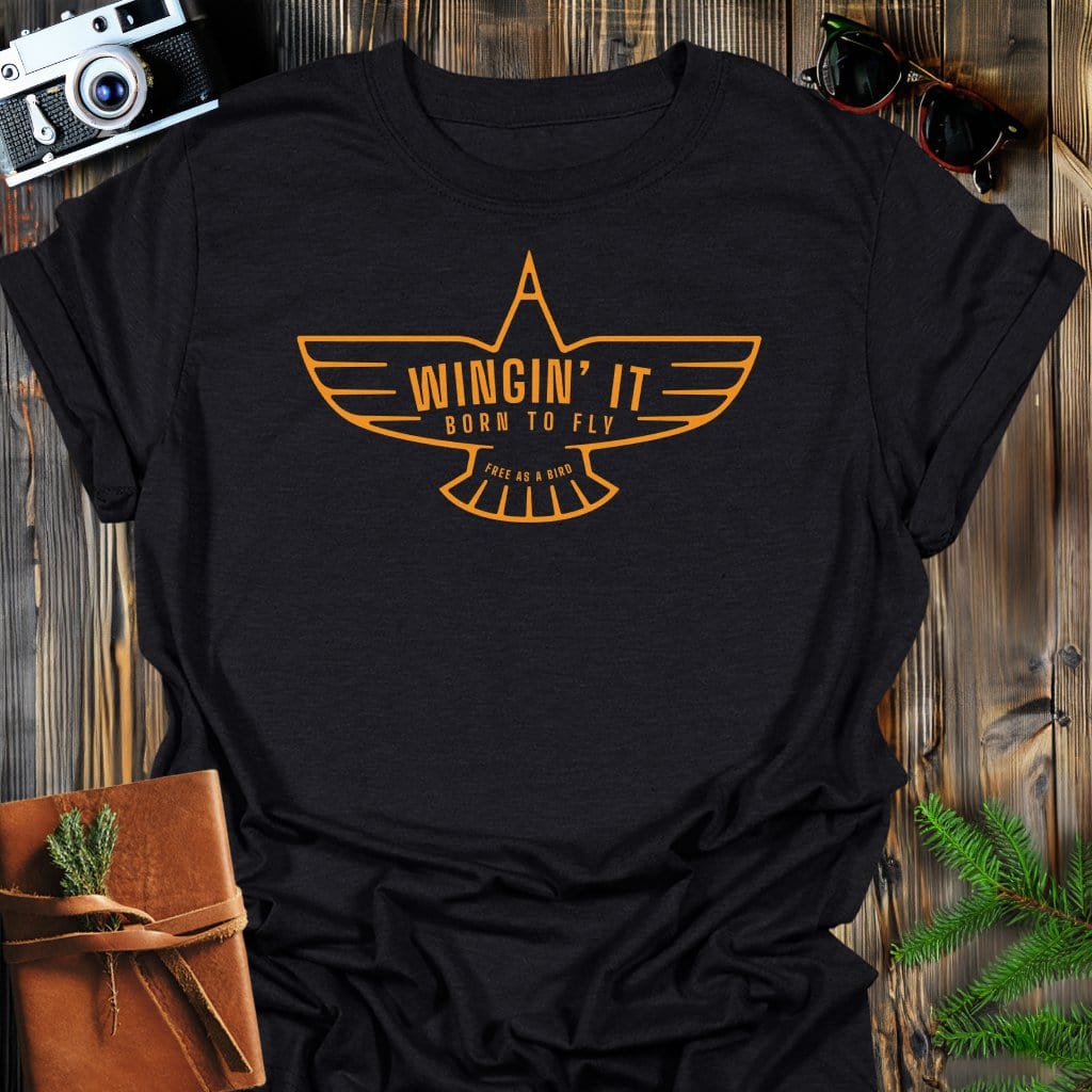 Wingin' It T-Shirt In Black / S Lightweight adventure tee for outdoor lovers Perfect for hiking camping or road trips Made from soft breathable cotton for all-day comfort Ideal for nature lovers and adventurers FAYO Threads outdoor apparel remember Fun Awaits You Outside
