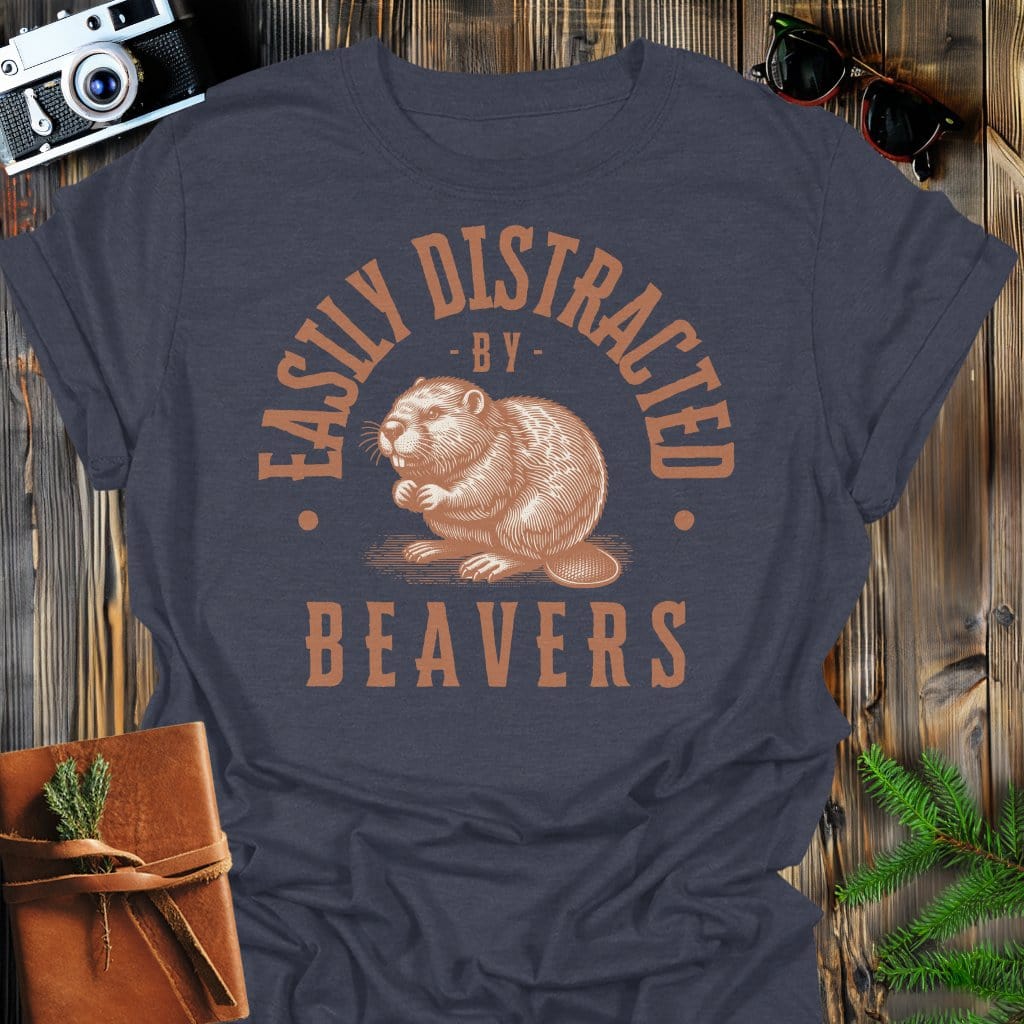 Distracted by Beavers T-Shirt In S / Dark Heather Lightweight adventure tee for outdoor lovers Perfect for hiking camping or road trips Made from soft breathable cotton for all-day comfort Ideal for nature lovers and adventurers FAYO Threads outdoor apparel remember Fun Awaits You Outside