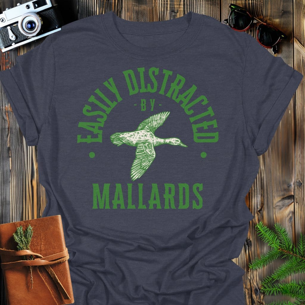 Distracted by Mallards T-Shirt In S / Dark Heather Lightweight adventure tee for outdoor lovers Perfect for hiking camping or road trips Made from soft breathable cotton for all-day comfort Ideal for nature lovers and adventurers FAYO Threads outdoor apparel remember Fun Awaits You Outside