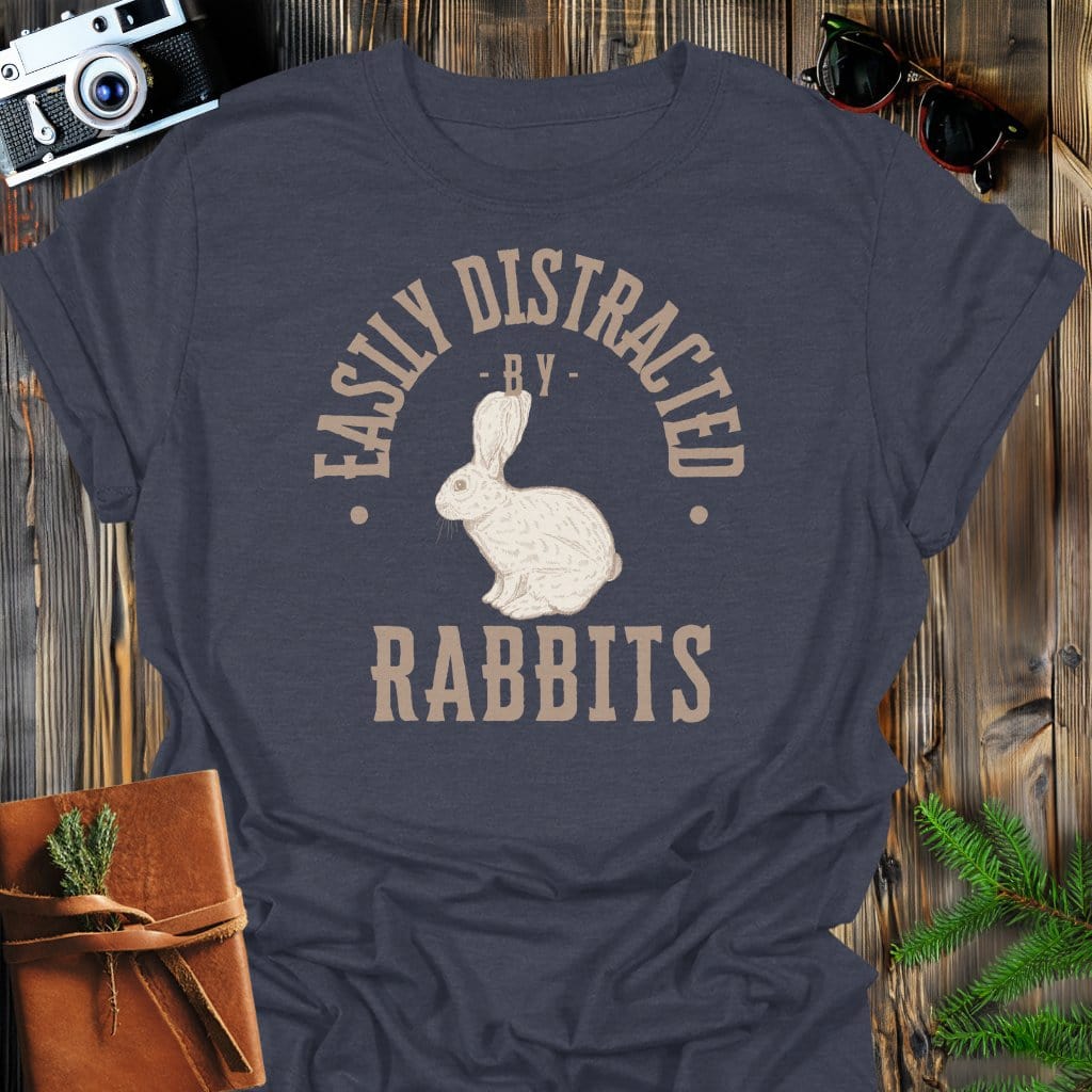Distracted By Rabbits T-Shirt In S / Dark Heather Lightweight adventure tee for outdoor lovers Perfect for hiking camping or road trips Made from soft breathable cotton for all-day comfort Ideal for nature lovers and adventurers FAYO Threads outdoor apparel remember Fun Awaits You Outside