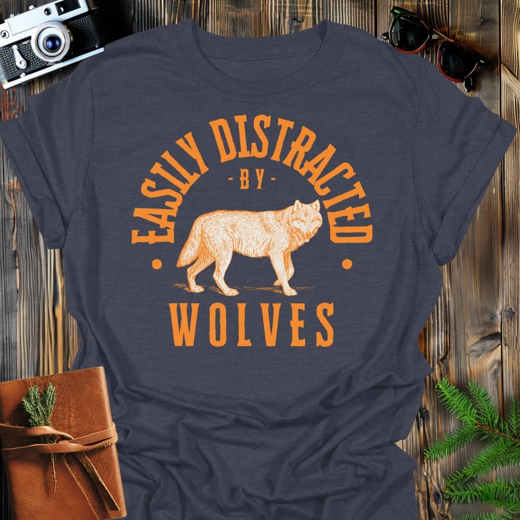 Distracted by Wolves T-Shirt In S / Dark Heather Lightweight adventure tee for outdoor lovers Perfect for hiking camping or road trips Made from soft breathable cotton for all-day comfort Ideal for nature lovers and adventurers FAYO Threads outdoor apparel remember Fun Awaits You Outside