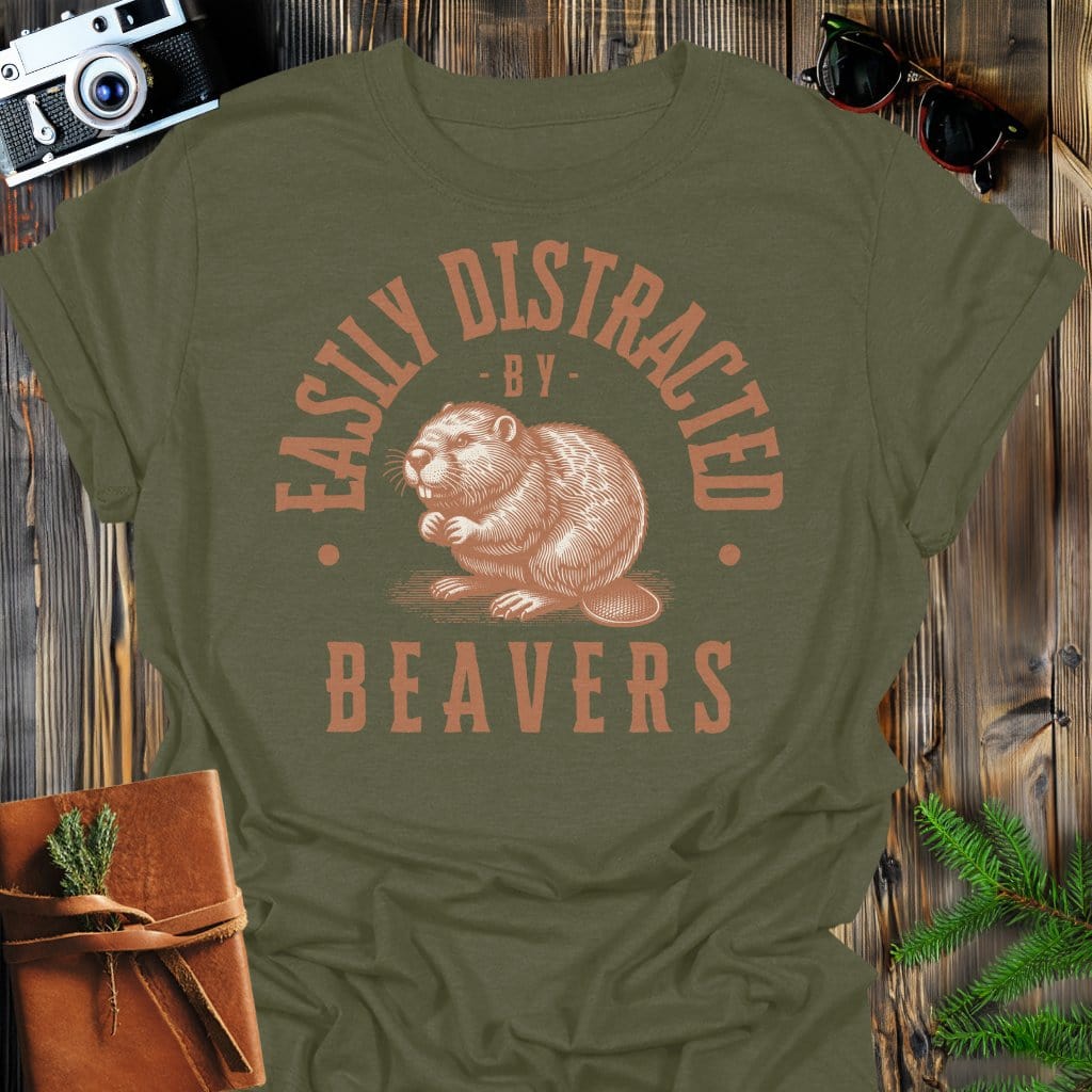 Distracted by Beavers T-Shirt In S / Military Green Lightweight adventure tee for outdoor lovers Perfect for hiking camping or road trips Made from soft breathable cotton for all-day comfort Ideal for nature lovers and adventurers FAYO Threads outdoor apparel remember Fun Awaits You Outside