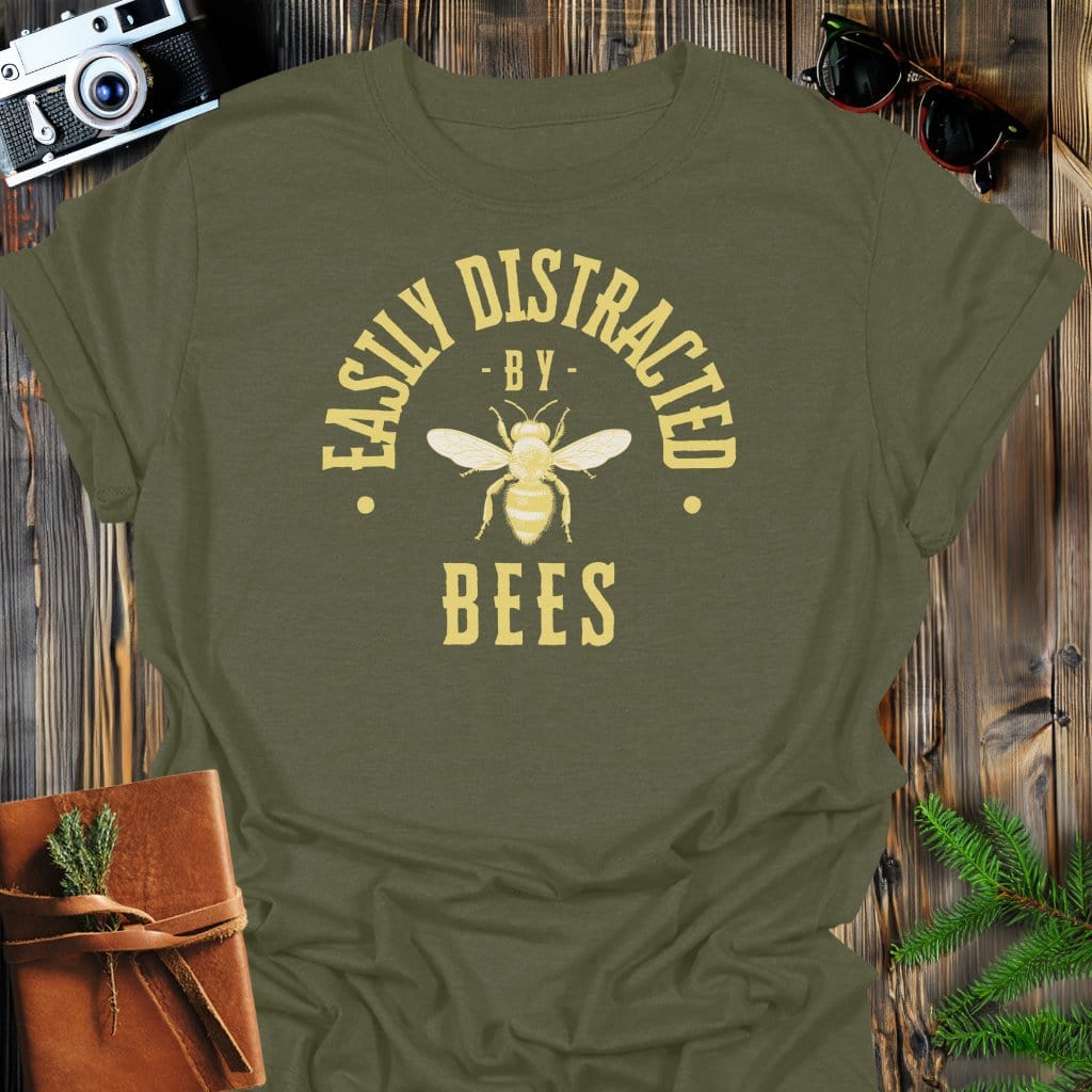 Distracted By Bees T-Shirt In S / Military Green Lightweight adventure tee for outdoor lovers Perfect for hiking camping or road trips Made from soft breathable cotton for all-day comfort Ideal for nature lovers and adventurers FAYO Threads outdoor apparel remember Fun Awaits You Outside
