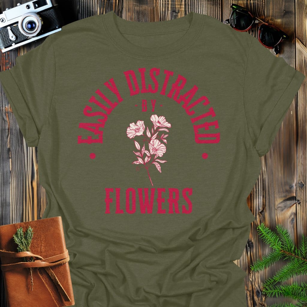 Distracted by Flowers T-Shirt In S / Military Green Lightweight adventure tee for outdoor lovers Perfect for hiking camping or road trips Made from soft breathable cotton for all-day comfort Ideal for nature lovers and adventurers FAYO Threads outdoor apparel remember Fun Awaits You Outside