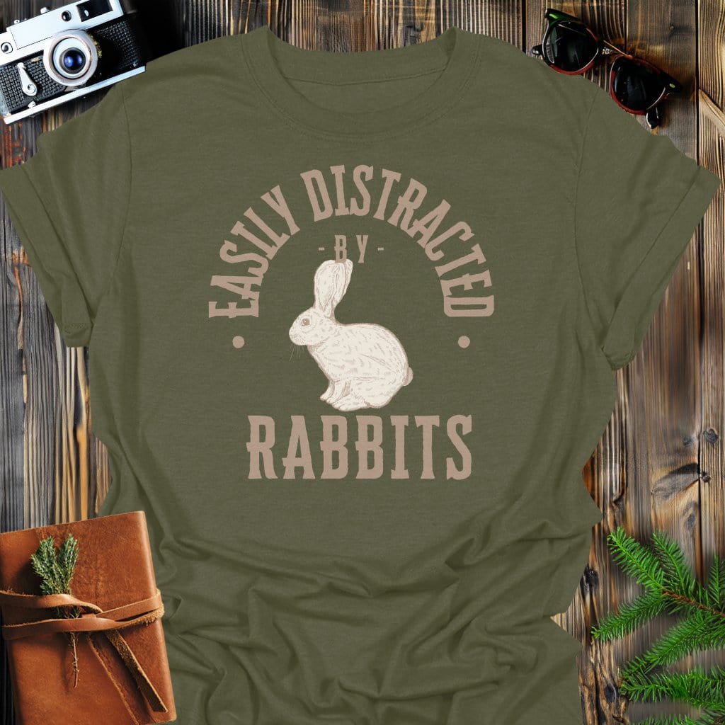Distracted By Rabbits T-Shirt In S / Military Green Lightweight adventure tee for outdoor lovers Perfect for hiking camping or road trips Made from soft breathable cotton for all-day comfort Ideal for nature lovers and adventurers FAYO Threads outdoor apparel remember Fun Awaits You Outside