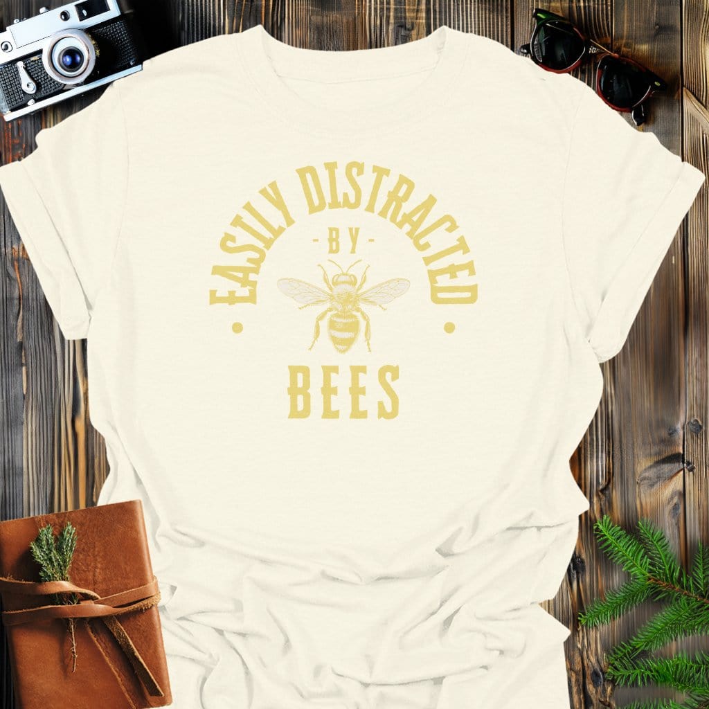 Distracted By Bees T-Shirt In S / Natural Lightweight adventure tee for outdoor lovers Perfect for hiking camping or road trips Made from soft breathable cotton for all-day comfort Ideal for nature lovers and adventurers FAYO Threads outdoor apparel remember Fun Awaits You Outside