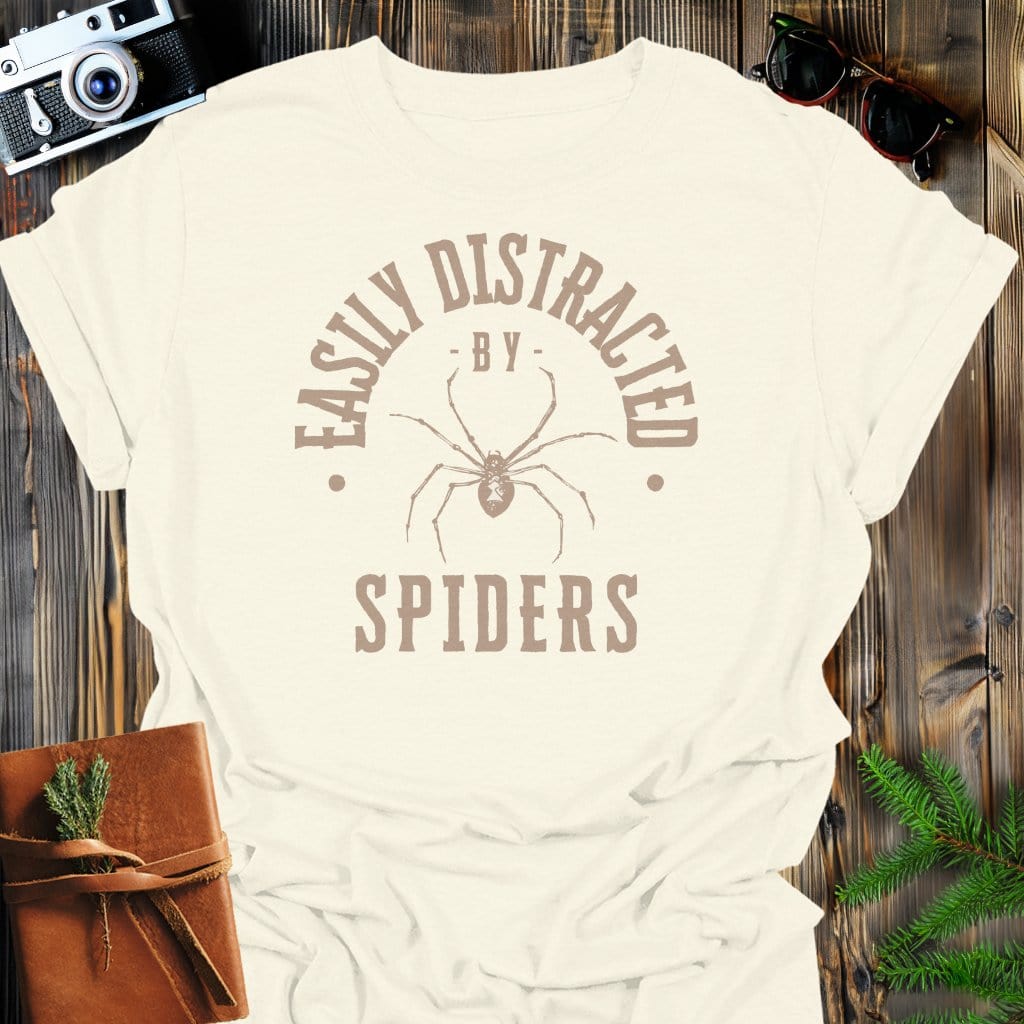Distracted By Spiders T-Shirt In S / Natural Lightweight adventure tee for outdoor lovers Perfect for hiking camping or road trips Made from soft breathable cotton for all-day comfort Ideal for nature lovers and adventurers FAYO Threads outdoor apparel remember Fun Awaits You Outside