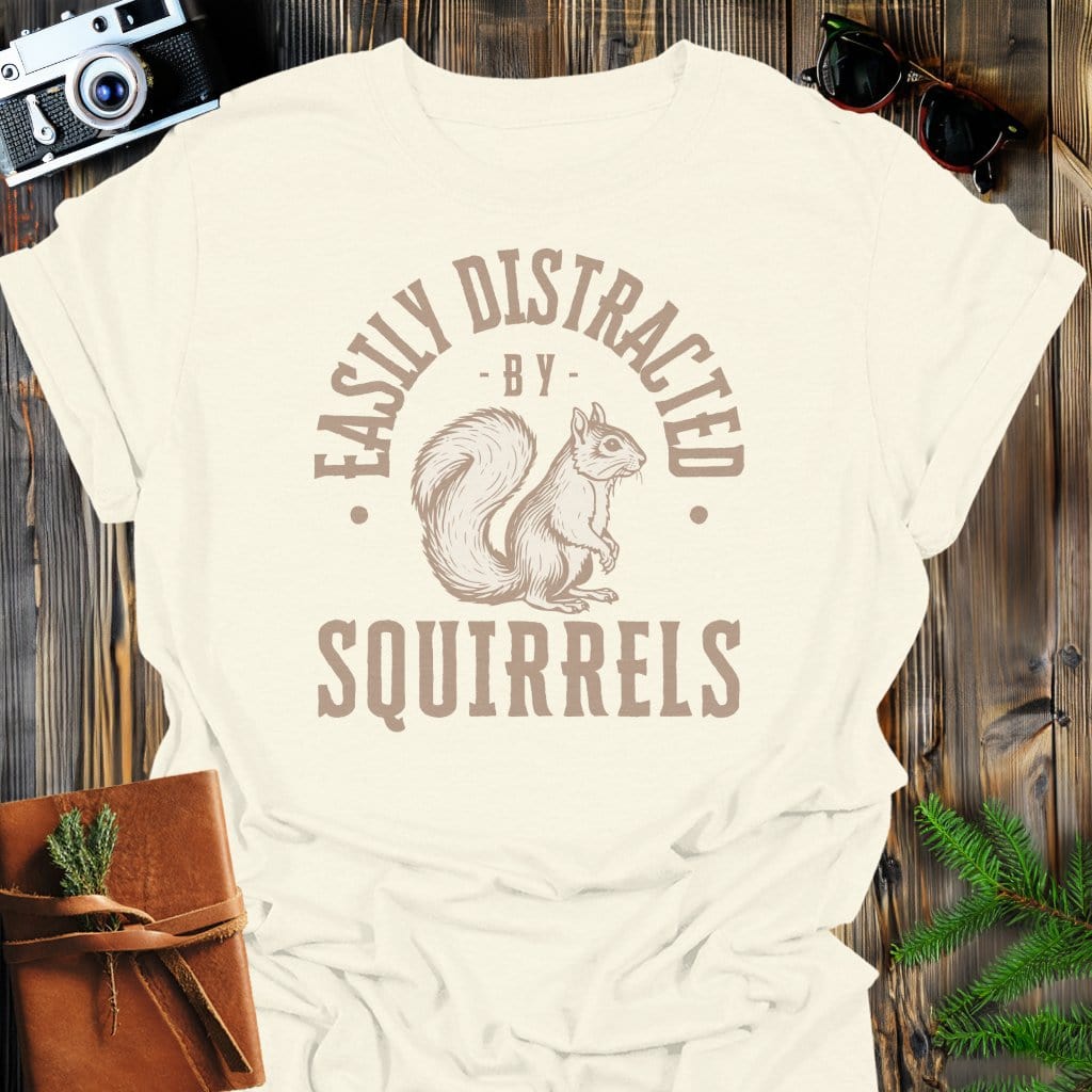 Distracted By Squirrels T-Shirt In S / Natural Lightweight adventure tee for outdoor lovers Perfect for hiking camping or road trips Made from soft breathable cotton for all-day comfort Ideal for nature lovers and adventurers FAYO Threads outdoor apparel remember Fun Awaits You Outside