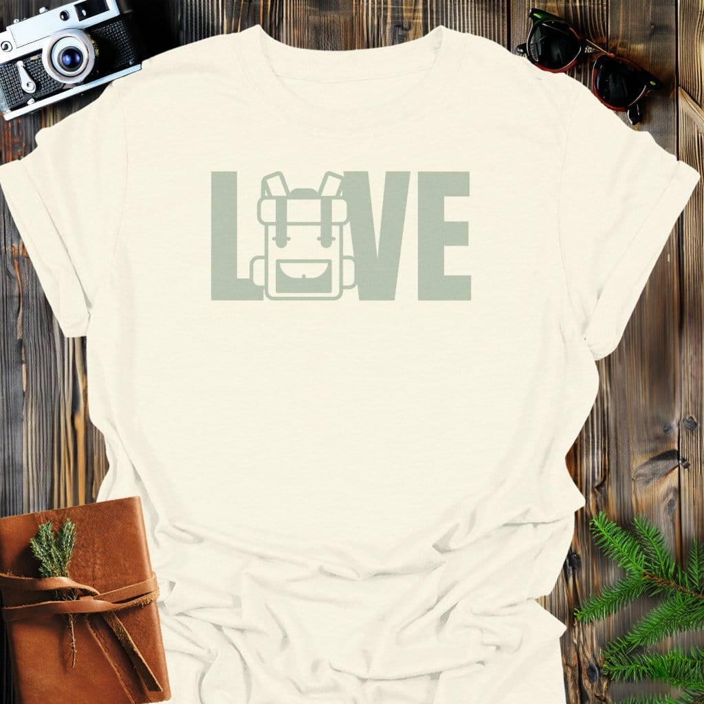 Love Hiking Backpack T-Shirt In Natural / S Lightweight adventure tee for outdoor lovers Perfect for hiking camping or road trips Made from soft breathable cotton for all-day comfort Ideal for nature lovers and adventurers FAYO Threads outdoor apparel remember Fun Awaits You Outside
