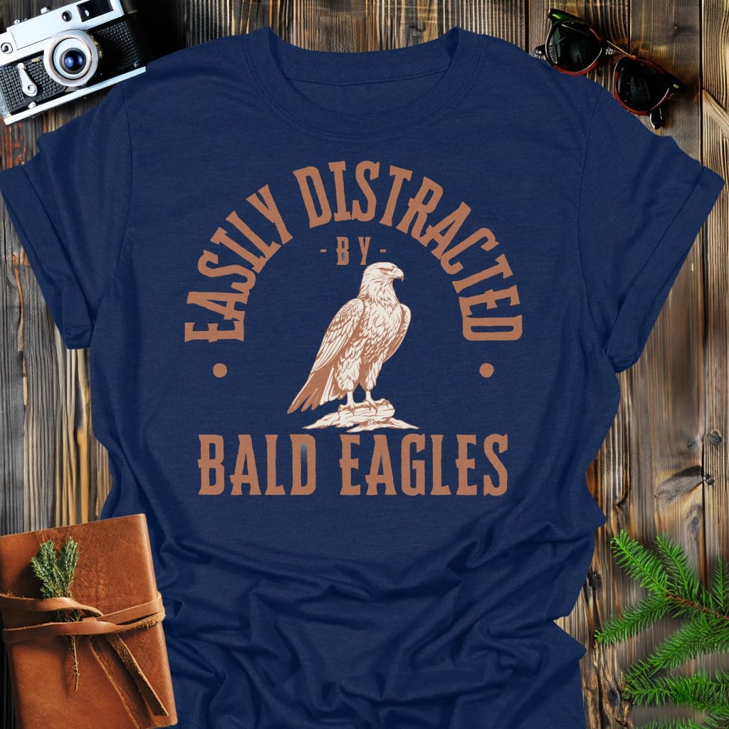 Distracted by Bald Eagles T-Shirt In S / Navy Lightweight adventure tee for outdoor lovers Perfect for hiking camping or road trips Made from soft breathable cotton for all-day comfort Ideal for nature lovers and adventurers FAYO Threads outdoor apparel remember Fun Awaits You Outside