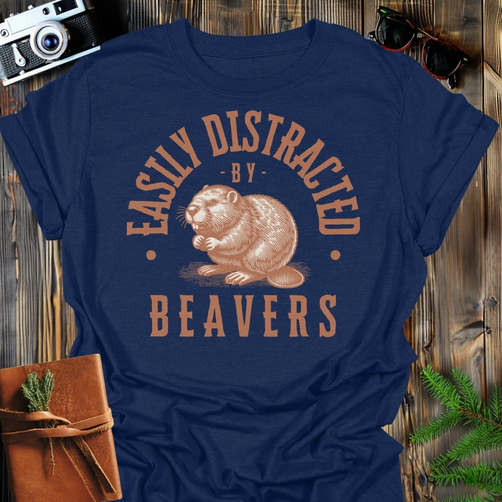 Distracted by Beavers T-Shirt In S / Navy Lightweight adventure tee for outdoor lovers Perfect for hiking camping or road trips Made from soft breathable cotton for all-day comfort Ideal for nature lovers and adventurers FAYO Threads outdoor apparel remember Fun Awaits You Outside