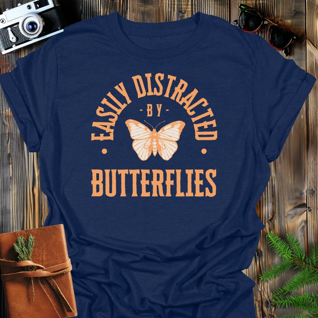 Distracted By Butterflies T-Shirt In S / Navy Lightweight adventure tee for outdoor lovers Perfect for hiking camping or road trips Made from soft breathable cotton for all-day comfort Ideal for nature lovers and adventurers FAYO Threads outdoor apparel remember Fun Awaits You Outside