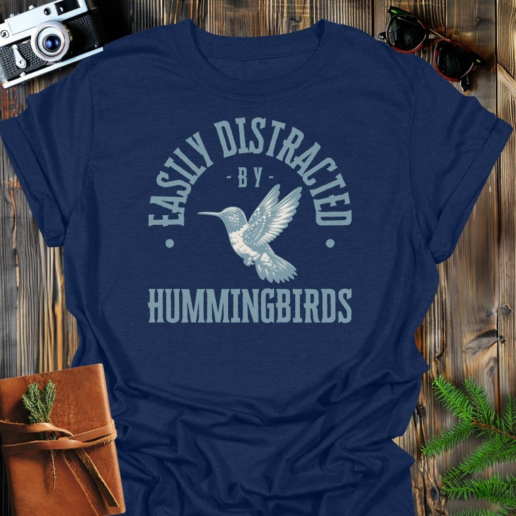 Distracted By Hummingbirds T-Shirt In S / Navy Lightweight adventure tee for outdoor lovers Perfect for hiking camping or road trips Made from soft breathable cotton for all-day comfort Ideal for nature lovers and adventurers FAYO Threads outdoor apparel remember Fun Awaits You Outside