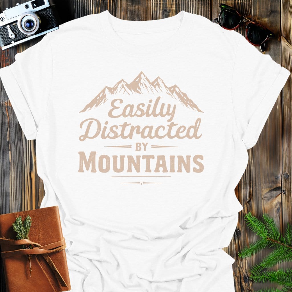 Distracted by Mountains T-Shirt In S / White Lightweight adventure tee for outdoor lovers Perfect for hiking camping or road trips Made from soft breathable cotton for all-day comfort Ideal for nature lovers and adventurers FAYO Threads outdoor apparel remember Fun Awaits You Outside