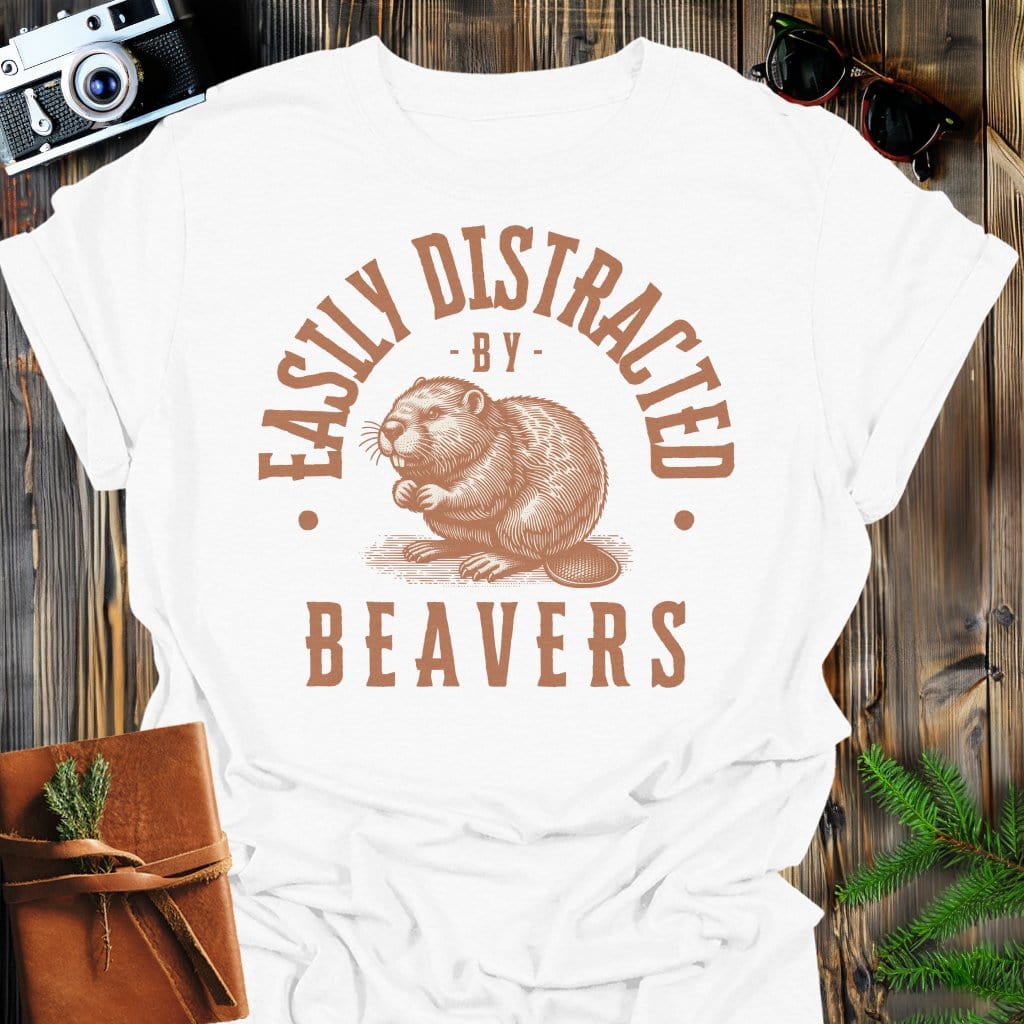 Distracted by Beavers T-Shirt In S / White Lightweight adventure tee for outdoor lovers Perfect for hiking camping or road trips Made from soft breathable cotton for all-day comfort Ideal for nature lovers and adventurers FAYO Threads outdoor apparel remember Fun Awaits You Outside