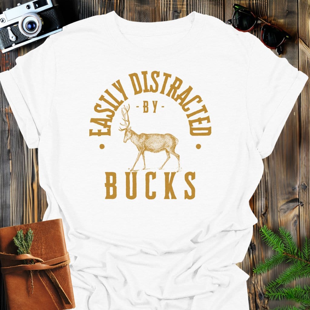 Distracted By Bucks T-Shirt In S / White Lightweight adventure tee for outdoor lovers Perfect for hiking camping or road trips Made from soft breathable cotton for all-day comfort Ideal for nature lovers and adventurers FAYO Threads outdoor apparel remember Fun Awaits You Outside