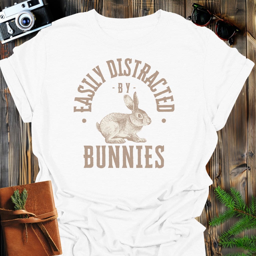 Distracted By Bunnies T-Shirt In S / White Lightweight adventure tee for outdoor lovers Perfect for hiking camping or road trips Made from soft breathable cotton for all-day comfort Ideal for nature lovers and adventurers FAYO Threads outdoor apparel remember Fun Awaits You Outside