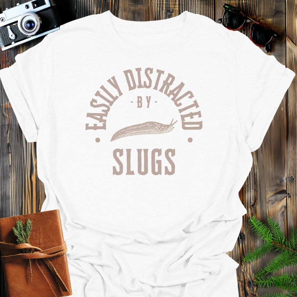 Distracted By Slugs T-Shirt In S / White Lightweight adventure tee for outdoor lovers Perfect for hiking camping or road trips Made from soft breathable cotton for all-day comfort Ideal for nature lovers and adventurers FAYO Threads outdoor apparel remember Fun Awaits You Outside