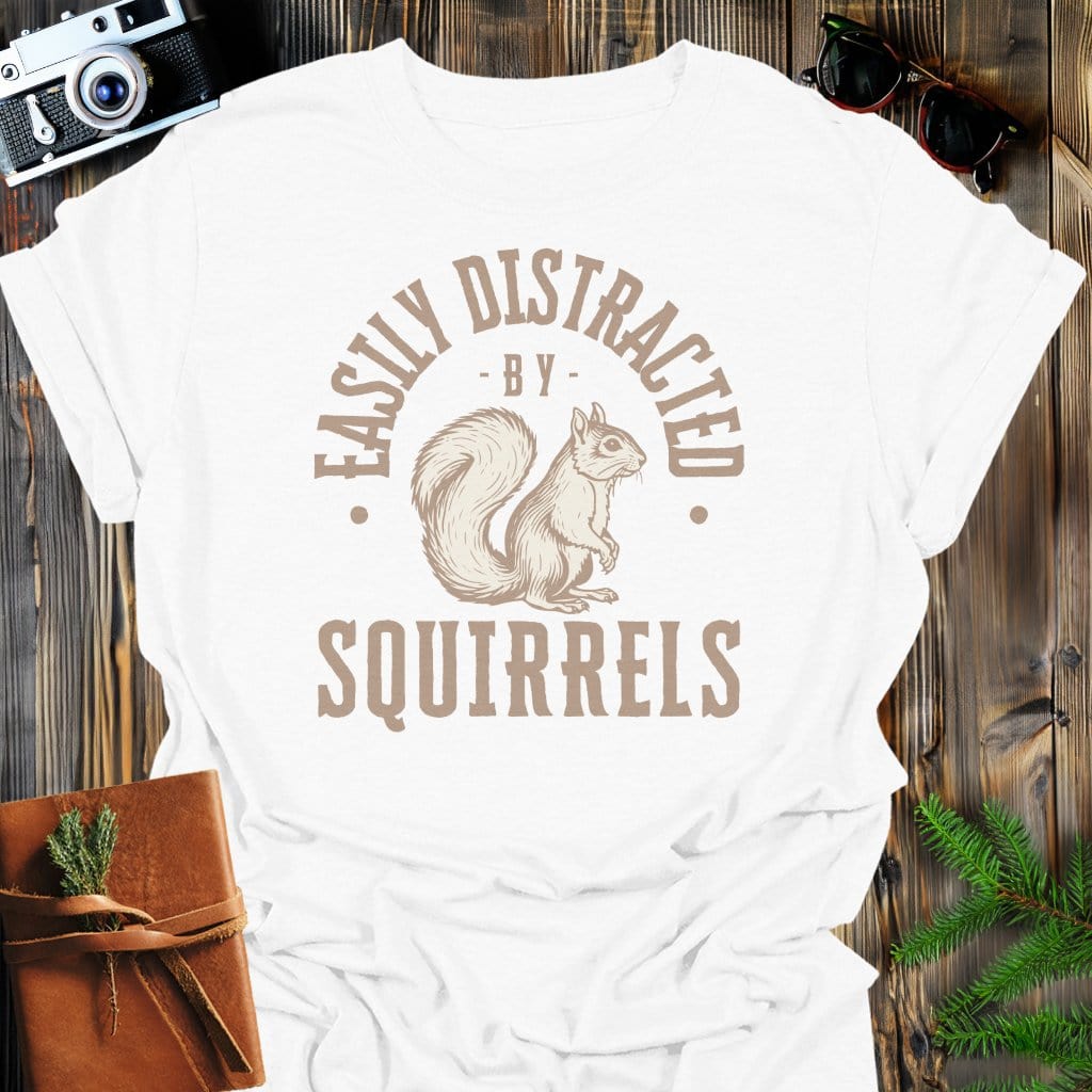 Distracted By Squirrels T-Shirt In S / White Lightweight adventure tee for outdoor lovers Perfect for hiking camping or road trips Made from soft breathable cotton for all-day comfort Ideal for nature lovers and adventurers FAYO Threads outdoor apparel remember Fun Awaits You Outside