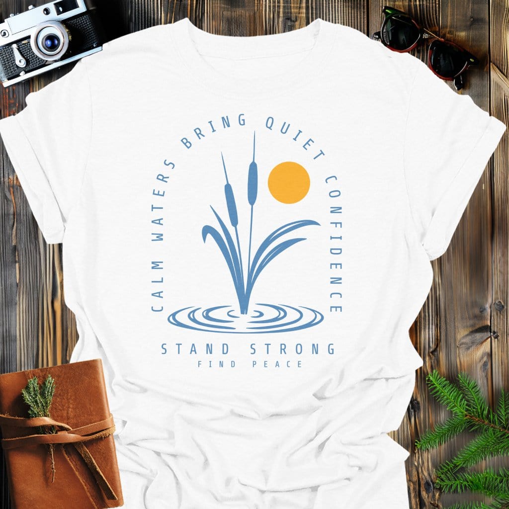 Calm Waters Bring Quiet Confidence Cattail Sunset T-Shirt In White / S Lightweight adventure tee for outdoor lovers Perfect for hiking camping or road trips Made from soft breathable cotton for all-day comfort Ideal for nature lovers and adventurers FAYO Threads outdoor apparel remember Fun Awaits You Outside