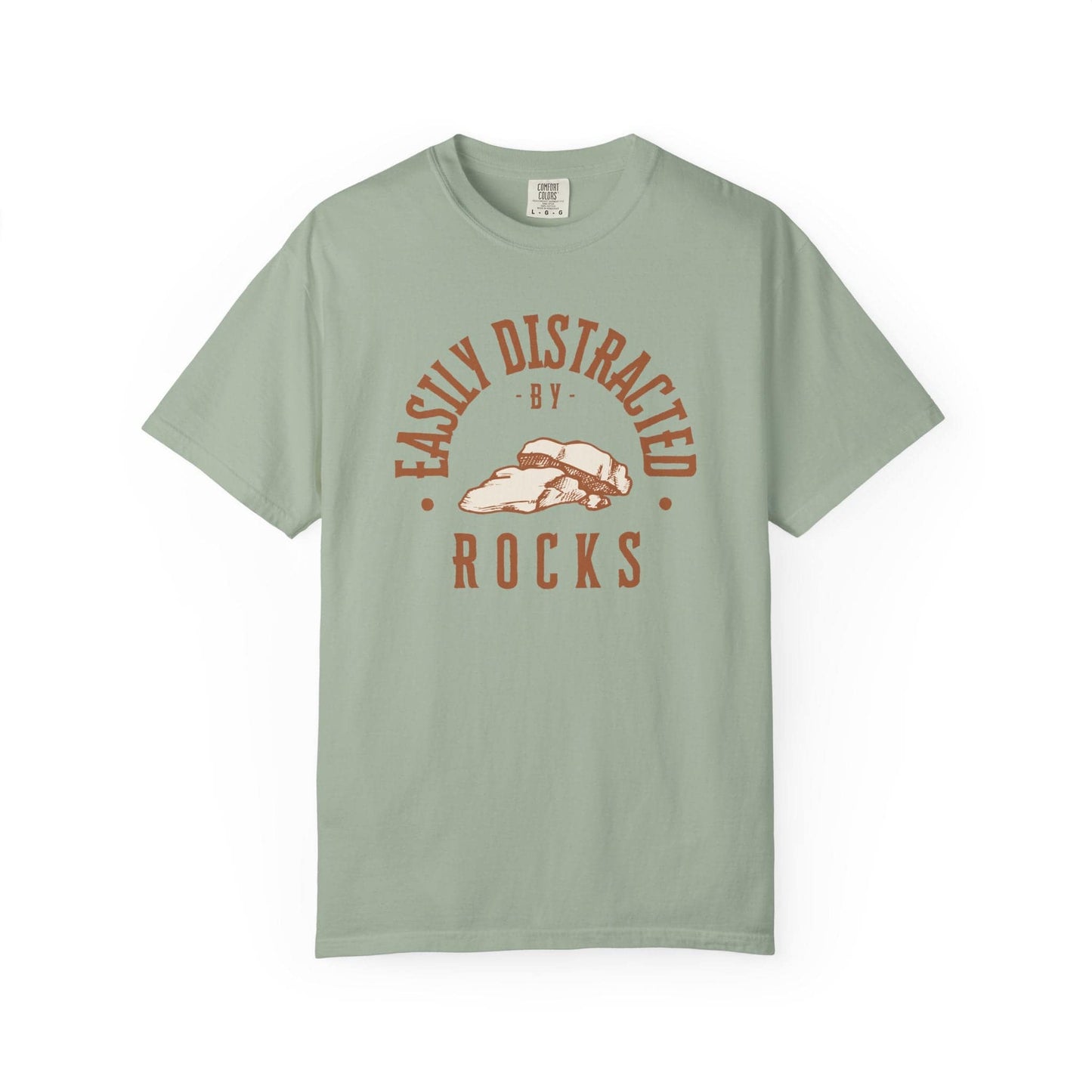 Easily Distracted by Rocks T-Shirt In Bay / S Lightweight adventure tee for outdoor lovers Perfect for hiking camping or road trips Made from soft breathable cotton for all-day comfort Ideal for nature lovers and adventurers FAYO Threads outdoor apparel remember Fun Awaits You Outside