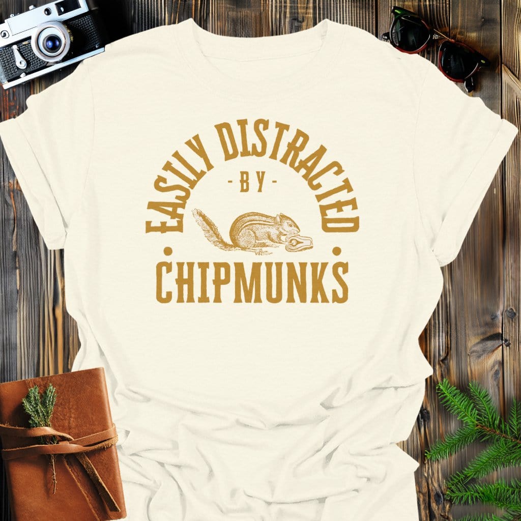 Distracted By Chipmunks T-Shirt In Natural / S Lightweight adventure tee for outdoor lovers Perfect for hiking camping or road trips Made from soft breathable cotton for all-day comfort Ideal for nature lovers and adventurers FAYO Threads outdoor apparel remember Fun Awaits You Outside