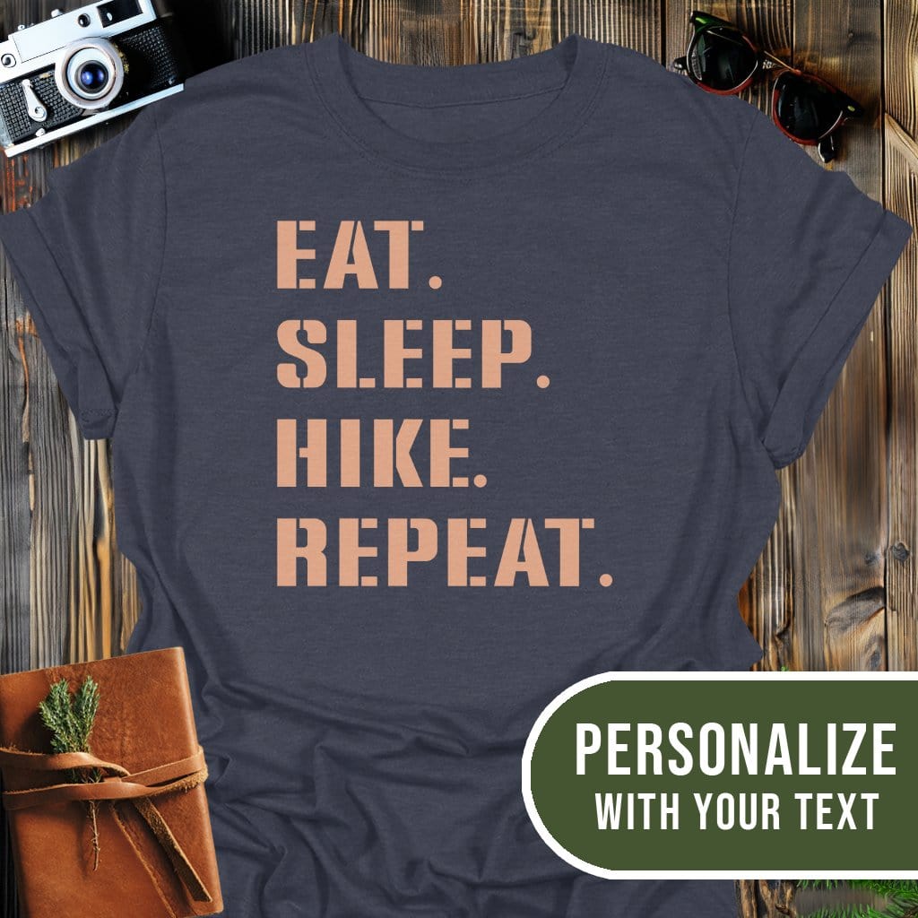 Personalized Hike Repeat T-Shirt In Dark Heather / S Lightweight adventure tee for outdoor lovers Perfect for hiking camping or road trips Made from soft breathable cotton for all-day comfort Ideal for nature lovers and adventurers FAYO Threads outdoor apparel remember Fun Awaits You Outside