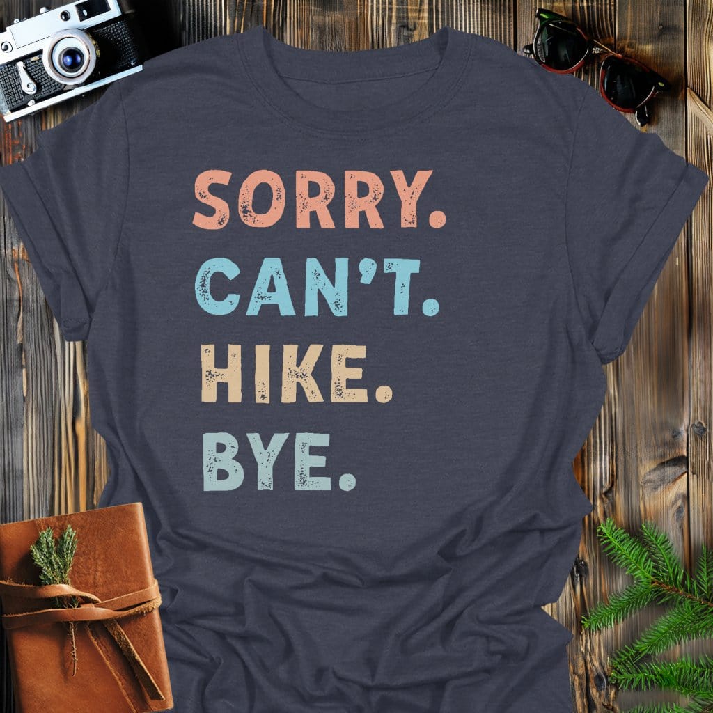 Sorry Can't Hike Bye T-Shirt In Dark Heather / S Lightweight adventure tee for outdoor lovers Perfect for hiking camping or road trips Made from soft breathable cotton for all-day comfort Ideal for nature lovers and adventurers FAYO Threads outdoor apparel remember Fun Awaits You Outside