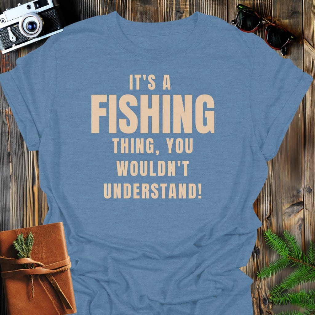 Fishing Life T-Shirt In Heather Indigo / S Lightweight adventure tee for outdoor lovers Perfect for hiking camping or road trips Made from soft breathable cotton for all-day comfort Ideal for nature lovers and adventurers FAYO Threads outdoor apparel remember Fun Awaits You Outside