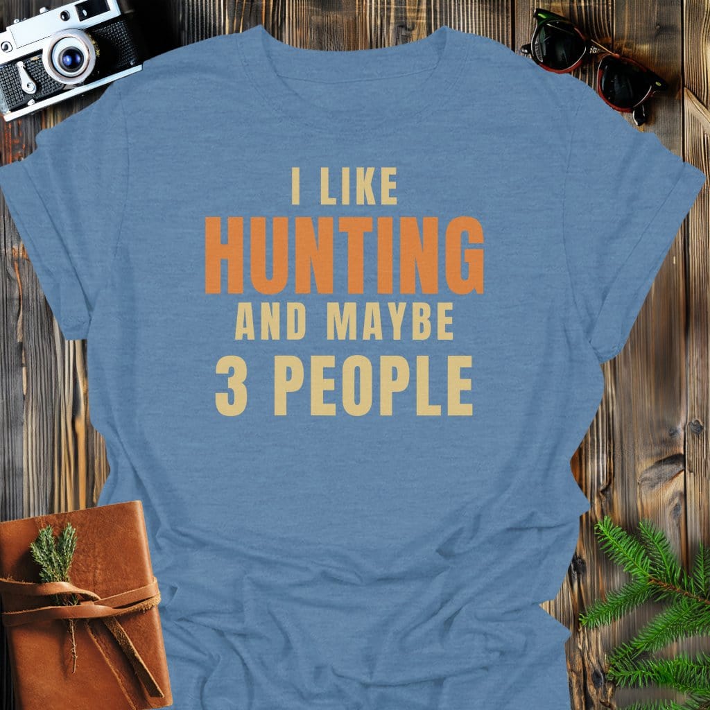 Hunting Humor T-Shirt In Heather Indigo / S Lightweight adventure tee for outdoor lovers Perfect for hiking camping or road trips Made from soft breathable cotton for all-day comfort Ideal for nature lovers and adventurers FAYO Threads outdoor apparel remember Fun Awaits You Outside