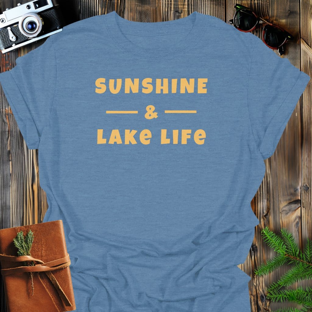 Sunshine Lake T-Shirt In Heather Indigo / S Lightweight adventure tee for outdoor lovers Perfect for hiking camping or road trips Made from soft breathable cotton for all-day comfort Ideal for nature lovers and adventurers FAYO Threads outdoor apparel remember Fun Awaits You Outside