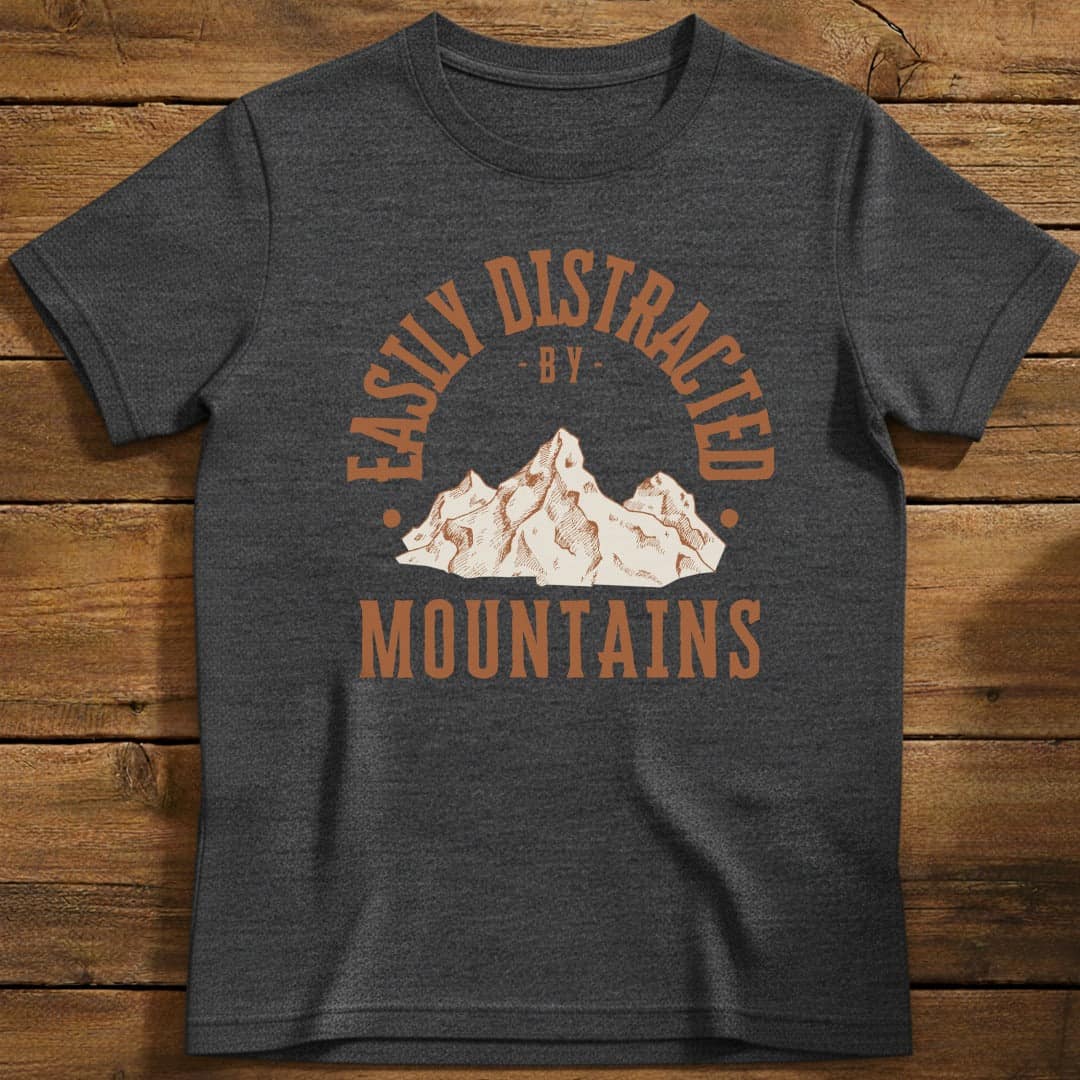 Distracted by Mountains T-Shirt In S / Heather Navy Lightweight adventure tee for outdoor lovers Perfect for hiking camping or road trips Made from soft breathable cotton for all-day comfort Ideal for nature lovers and adventurers FAYO Threads outdoor apparel remember Fun Awaits You Outside