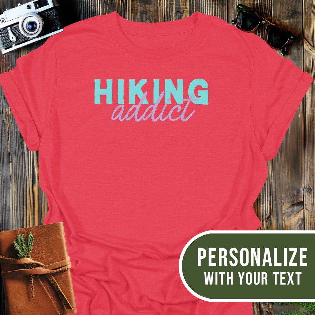 Personalized Hiking Addict T-Shirt In Heather Red / S Lightweight adventure tee for outdoor lovers Perfect for hiking camping or road trips Made from soft breathable cotton for all-day comfort Ideal for nature lovers and adventurers FAYO Threads outdoor apparel remember Fun Awaits You Outside