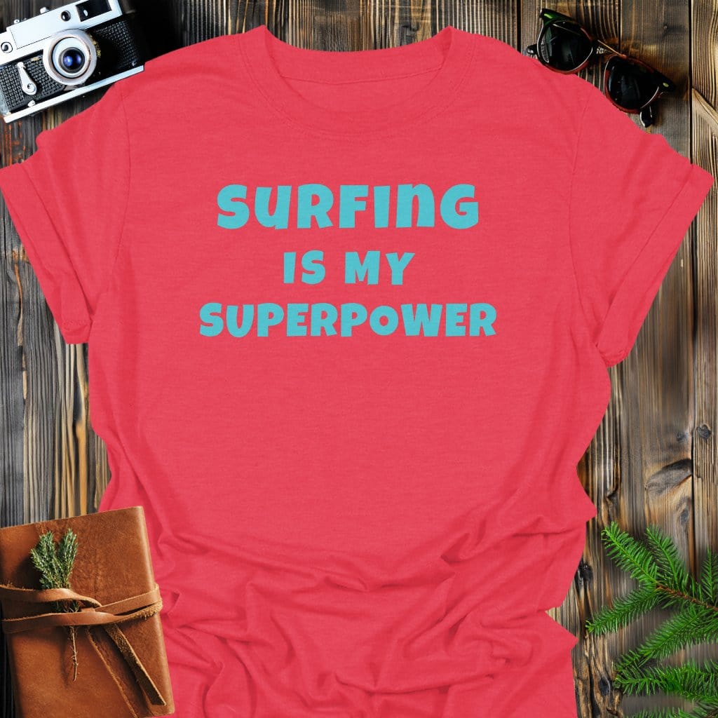 Surfing Superpower T-Shirt In Heather Red / S Lightweight adventure tee for outdoor lovers Perfect for hiking camping or road trips Made from soft breathable cotton for all-day comfort Ideal for nature lovers and adventurers FAYO Threads outdoor apparel remember Fun Awaits You Outside