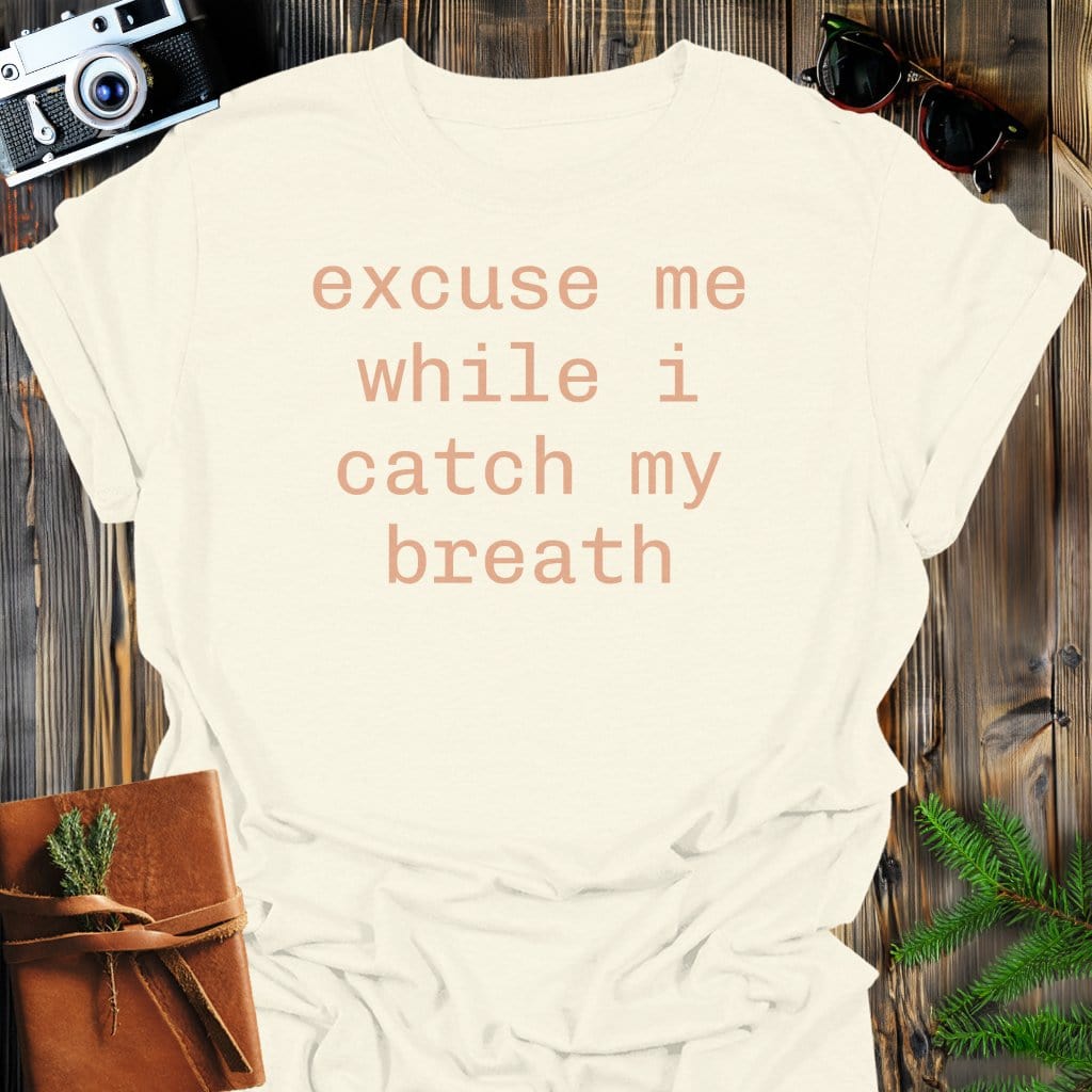 Catch My Breath T-Shirt In Natural / S Lightweight adventure tee for outdoor lovers Perfect for hiking camping or road trips Made from soft breathable cotton for all-day comfort Ideal for nature lovers and adventurers FAYO Threads outdoor apparel remember Fun Awaits You Outside