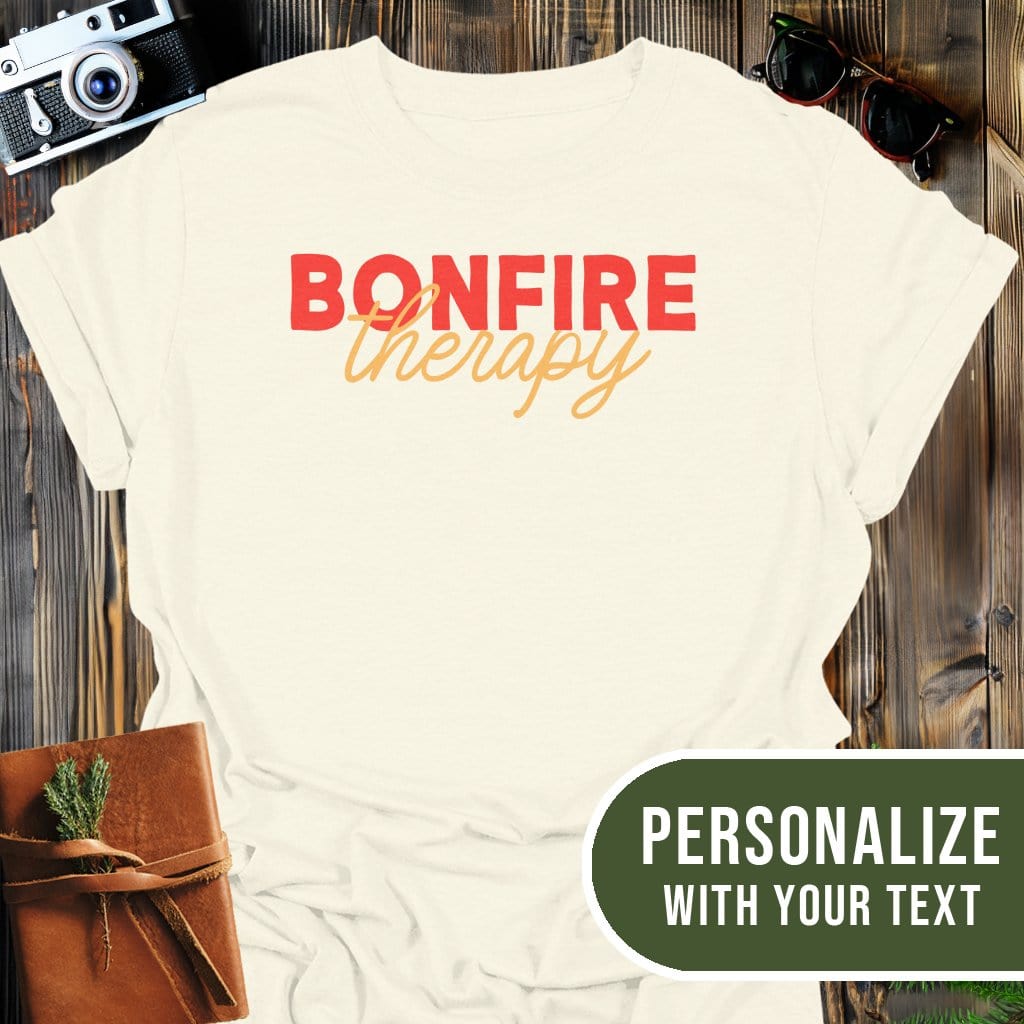 Personalized Bonfire Therapy T-Shirt In Natural / S Lightweight adventure tee for outdoor lovers Perfect for hiking camping or road trips Made from soft breathable cotton for all-day comfort Ideal for nature lovers and adventurers FAYO Threads outdoor apparel remember Fun Awaits You Outside
