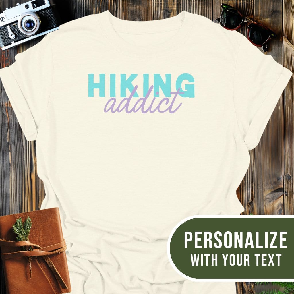 Personalized Hiking Addict T-Shirt In Natural / S Lightweight adventure tee for outdoor lovers Perfect for hiking camping or road trips Made from soft breathable cotton for all-day comfort Ideal for nature lovers and adventurers FAYO Threads outdoor apparel remember Fun Awaits You Outside