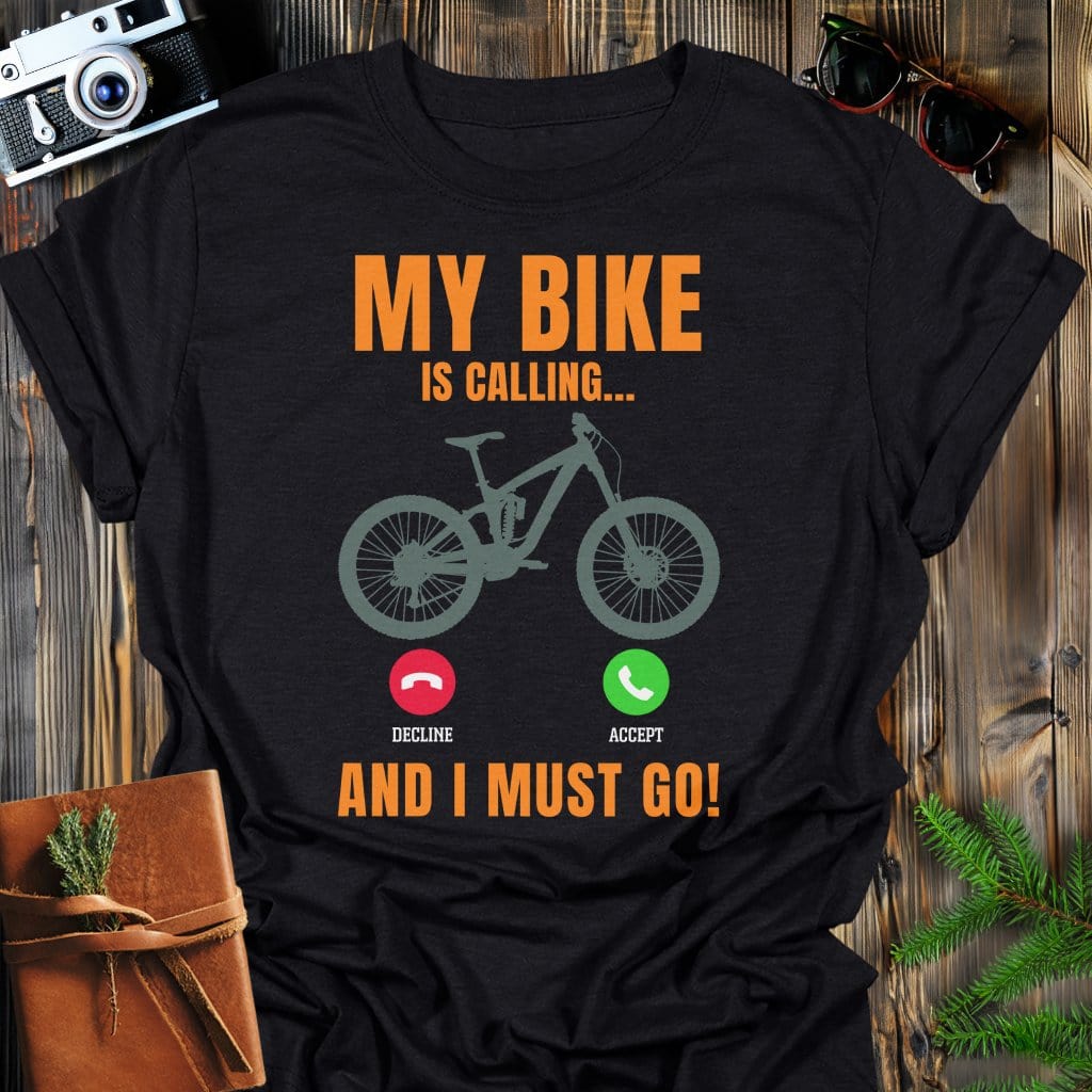 Bike Is Calling T-Shirt In Black / S Lightweight adventure tee for outdoor lovers Perfect for hiking camping or road trips Made from soft breathable cotton for all-day comfort Ideal for nature lovers and adventurers FAYO Threads outdoor apparel remember Fun Awaits You Outside