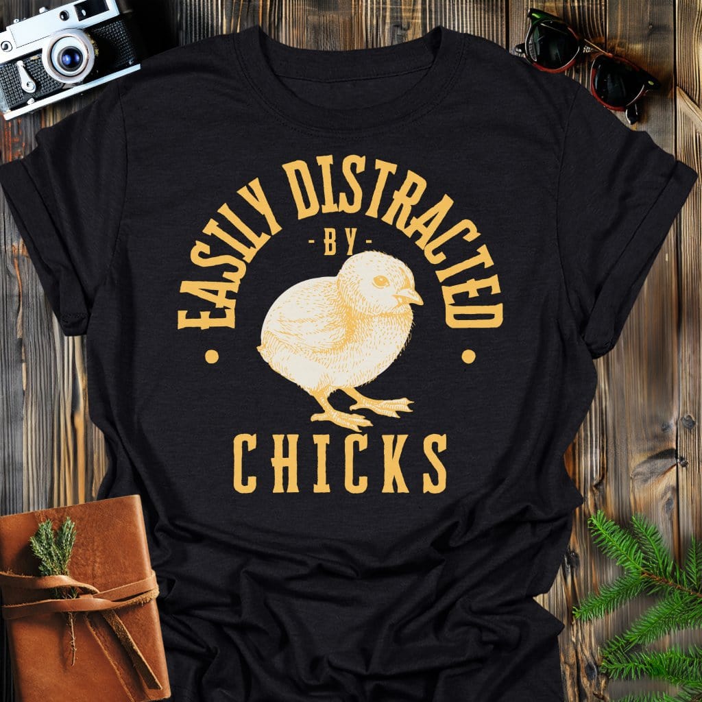 Distracted by Chicks T-Shirt In S / Black Lightweight adventure tee for outdoor lovers Perfect for hiking camping or road trips Made from soft breathable cotton for all-day comfort Ideal for nature lovers and adventurers FAYO Threads outdoor apparel remember Fun Awaits You Outside